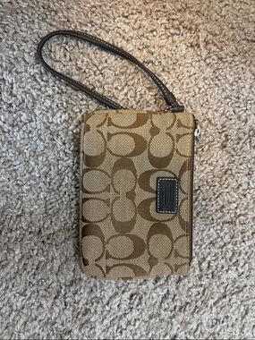 Coach brown small wristlet